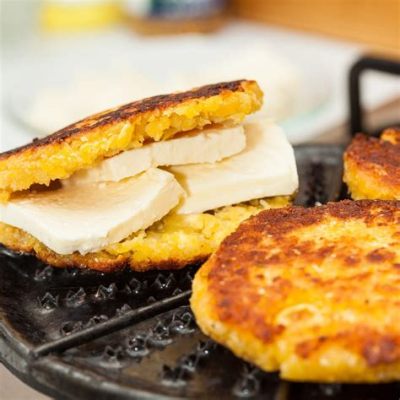 Arepas de Choclo: Uma explosão de sabor tropical com a cremosidade da manteiga derretida!